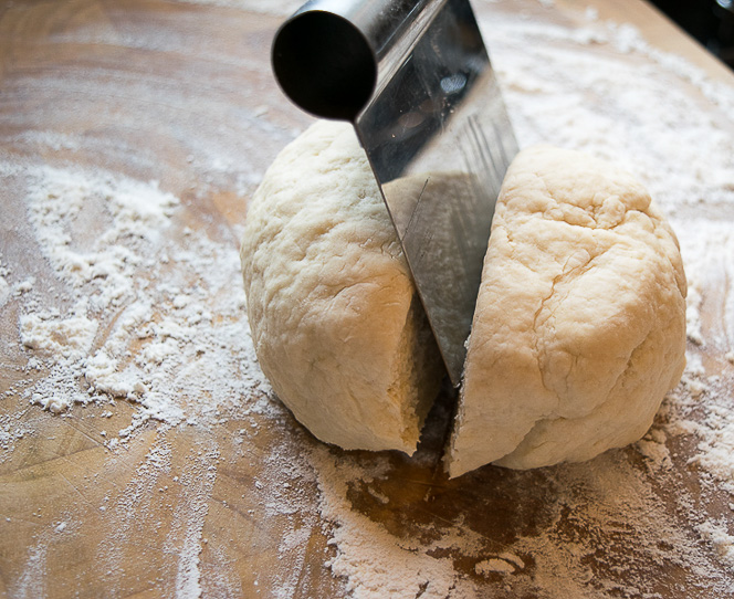 Divide dough into 2 equal parts.